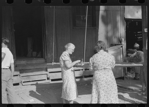 Untitled photo, possibly related to: Greensboro, Greene County, Georgia. Making a quilt from surplus commodity cotton
