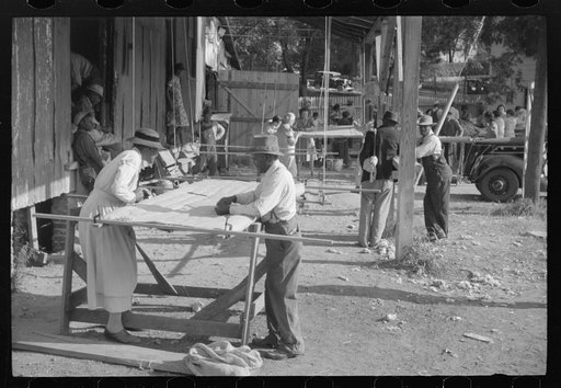 Making quilts from surplus commodity cotton in Greensboro, Greene County, Georgia
