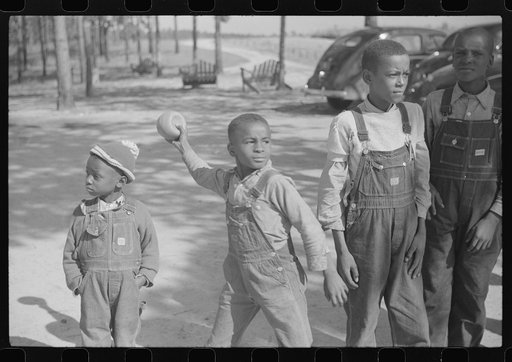 Greensboro (vicinity), Greene County, Georgia. Boyd Jones playing ball during the recess period at a Negro school