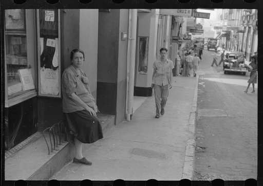 Untitled photo, possibly related to: Woman who asks for alms in the streets of San Juan, Puerto Rico