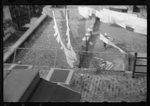 Untitled photo, possibly related to: Washing clothes on a rooftop in San Juan, Puerto Rico