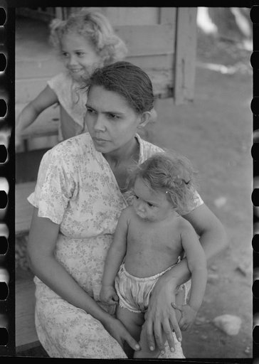 Untitled photo, possibly related to: Family in slum area known as "El Machuelitto," in Ponce, Puerto Rico