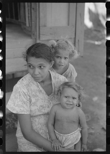 Untitled photo, possibly related to: Family in slum area known as "El Machuelitto," in Ponce, Puerto Rico