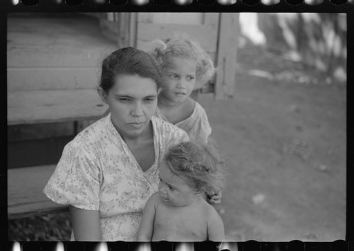 Untitled photo, possibly related to: Family in slum area known as "El Machuelitto," in Ponce, Puerto Rico