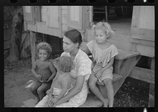 Untitled photo, possibly related to: Family in slum area known as "El Machuelitto," in Ponce, Puerto Rico