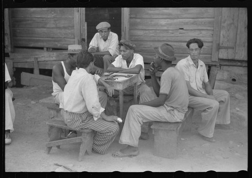 Playing dominoes in the slum area known as "El Machuelitto" in Ponce, Puerto Rico
