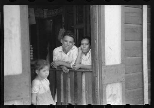 Untitled photo, possibly related to: Storekeeper and his wife in the slum area known as "El Machuelitto" in Ponce, Puerto Rico