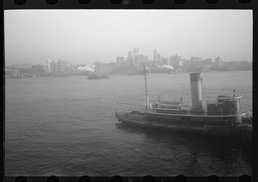 Untitled photo, possibly related to: A freighter pulling into New York Harbor