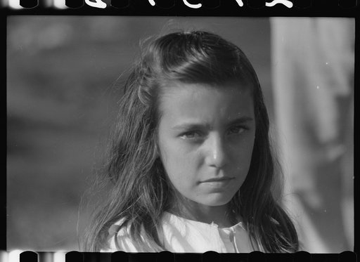 One of the girls in the glee club which sang at the celebration of tenant purchase FSA (Farm Security Administration) borrowers near Corozal, Puerto Rico
