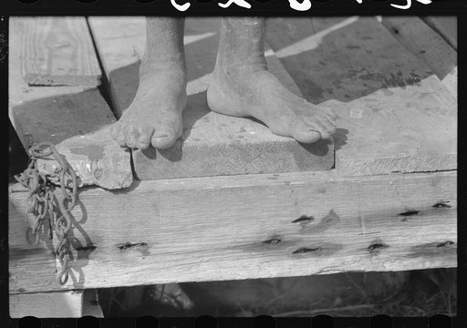 Feet of a Negro farmer, St. Croix, Virgin Islands
