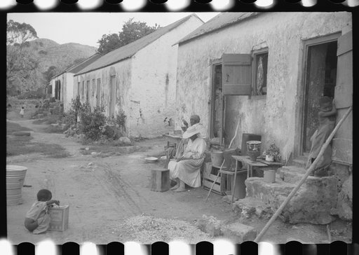 Untitled photo, possibly related to: Old slave quarters still being used in one of the slum "villages," St. Croix, Virgin Islands