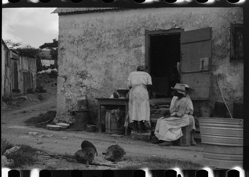 Untitled photo, possibly related to: Old Negro women living in one of the slum "villages" that used to be slave quarters. Near Christiansted, St. Croix, Virgin Islands