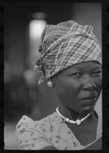 Untitled photo, possibly related to: Wife and child of a FSA (Farm Security Administration) borrower living in a homestead house near Fredericksted, St. Croix, Virgin Islands