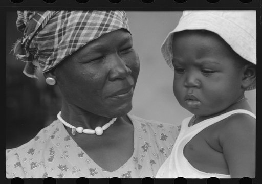 Wife and child of a FSA (Farm Security Administration) borrower living in a homestead house near Fredericksted, St. Croix, Virgin Islands