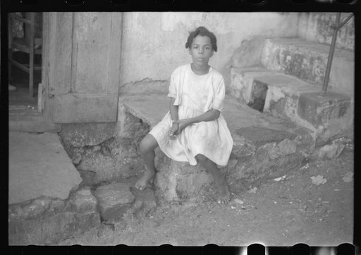 Untitled photo, possibly related to: Children living in one of the substandard houses on a side street in Charlotte Amalie, St. Thomas, Virgin Islands