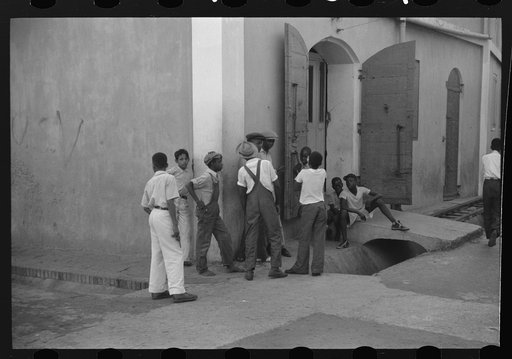 Untitled photo, possibly related to: Boys playing on a street corner in Charlotte Amalie, Virgin Islands