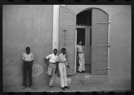 Untitled photo, possibly related to: Boys playing on a street corner in Charlotte Amalie, Virgin Islands