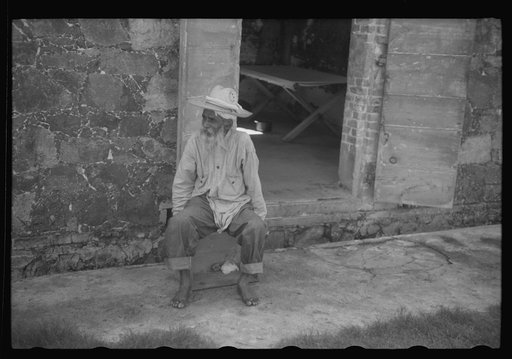 Untitled photo, possibly related to: Charlotte Amalie, St. Thomas Island, Virgin Islands. One of the inmates of the insane asylum at the hospital. He is an alien of Indian nationality, but cannot be sent back to India because of the expense and war conditions