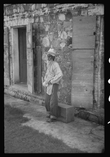 Untitled photo, possibly related to: Charlotte Amalie, St. Thomas Island, Virgin Islands. One of the inmates of the insane asylum at the hospital. He is an alien of Indian nationality, but cannot be sent back to India because of the expense and war conditions