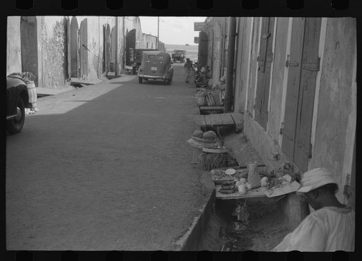 Untitled photo, possibly related to: Charlotte Amalie, St. Thomas Island, Virgin Islands. Vegetable vendor along a side street near the waterfront