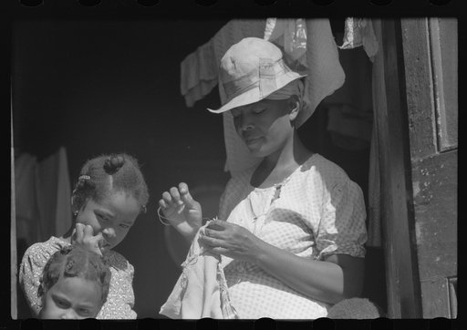 Charlotte Amalie, St. Thomas Island, Virgin Islands. Family living in a slum area