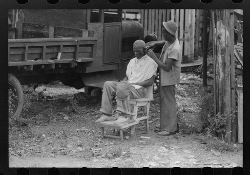 Untitled photo, possibly related to: Charlotte Amalie, St. Thomas Island, Virgin Islands. Barber in a slum area