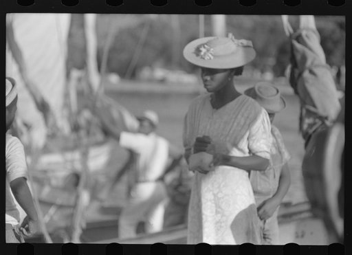 Untitled photo, possibly related to: Charlotte Amalie, St. Thomas Island, Virgin Islands. Shoppers on Tortolla wharf