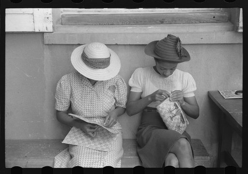 Charlotte Amalie, St. Thomas Island, Virgin Islands. Working on handbags at the handicrafts cooperative