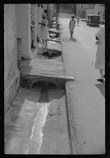 An open sewer on one of the main streets in Christiansted, Virgin Islands