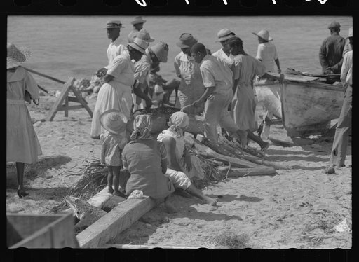 Untitled photo, possibly related to: Buying produce at the waterfront in Christiansted. Most of the food comes in little schooners from Puerto Rico and the neighboring islands. Virgin Islands