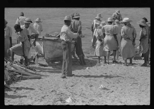 Untitled photo, possibly related to: Buying produce at the waterfront in Christiansted. Most of the food comes in little schooners from Puerto Rico and the neighboring islands. Virgin Islands