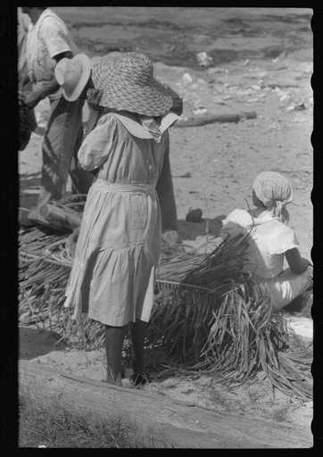 Untitled photo, possibly related to: Buying produce at the waterfront in Christiansted. Most of the food comes in little schooners from Puerto Rico and the neighboring islands. Virgin Islands