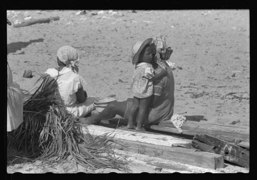 Untitled photo, possibly related to: Buying produce at the waterfront in Christiansted. Most of the food comes in little schooners from Puerto Rico and the neighboring islands. Virgin Islands