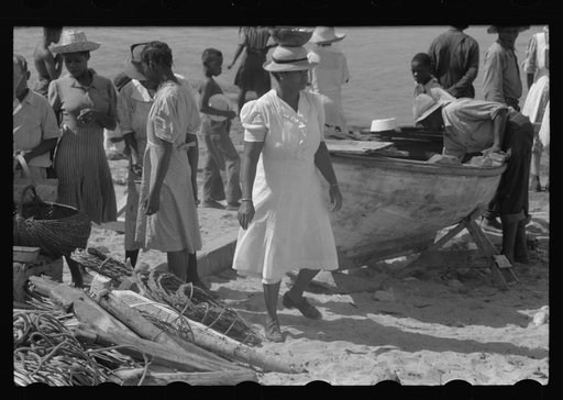 Untitled photo, possibly related to: Buying produce at the waterfront in Christiansted. Most of the food comes in little schooners from Puerto Rico and the neighboring islands. Virgin Islands