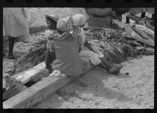 Untitled photo, possibly related to: Buying produce at the waterfront in Christiansted. Most of the food comes in little schooners from Puerto Rico and the neighboring islands. Virgin Islands