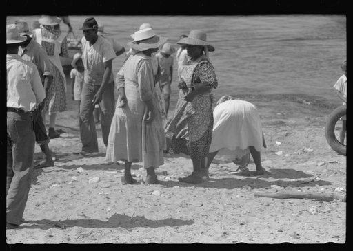 Untitled photo, possibly related to: Buying produce at the waterfront in Christiansted. Most of the food comes in little schooners from Puerto Rico and the neighboring islands. Virgin Islands