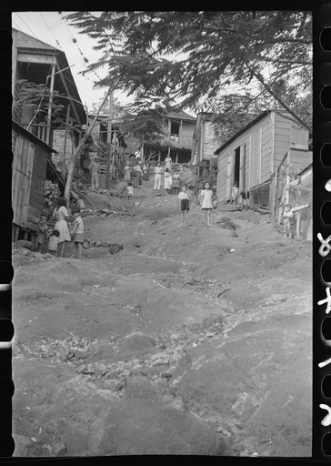 Untitled photo, possibly related to: Yauco, Puerto Rico. Street in the slum area