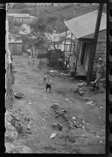 Untitled photo, possibly related to: Yauco, Puerto Rico. Street in the slum area