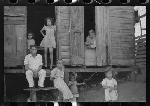Family living in a slum area in Yauco, Puerto Rico
