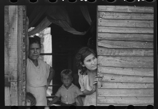 Family living in a slum area in Yauco, Puerto Rico