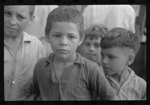 Children who were begging for pennies in the market in Rio Piedras, Puerto Rico