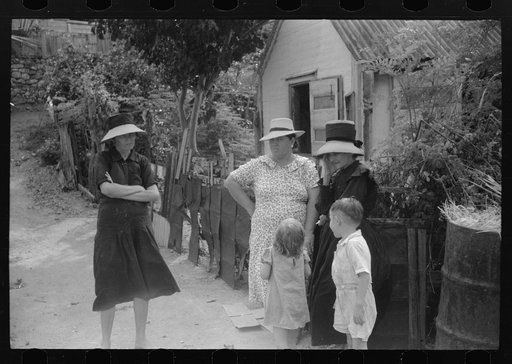 French-speaking women and children who live in the little colony known as the French Village, in the outskirts of Charlotte Amalie, St. Thomas, Virgin Islands
