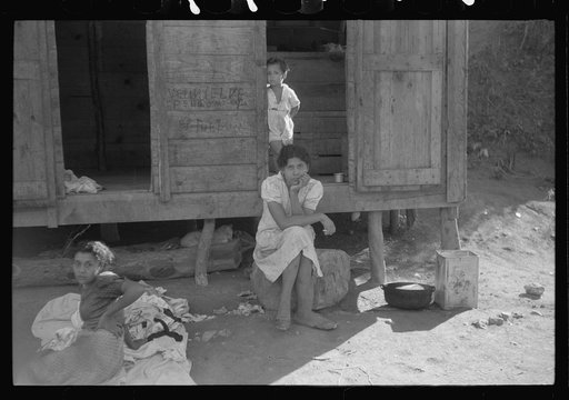 At the home of a farm laborer along the road in the hills near Yauco, Puerto Rico