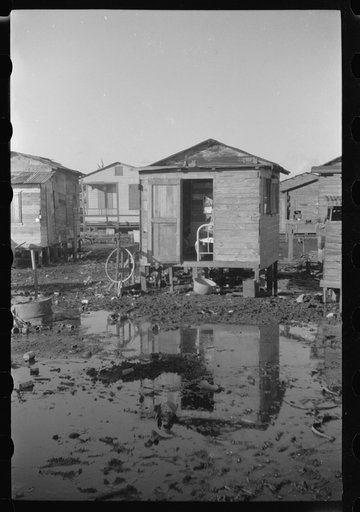 Untitled photo, possibly related to: San Juan, Puerto Rico. Children in the slum area known as El Fangitto
