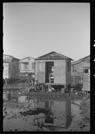 Untitled photo, possibly related to: San Juan, Puerto Rico. Children in the slum area known as El Fangitto