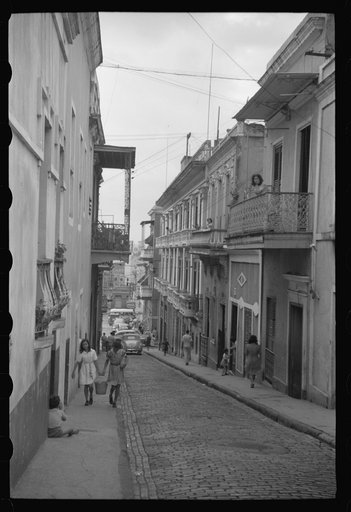 San Juan, Puerto Rico. People carrying water home because of the failure of the water system for three days