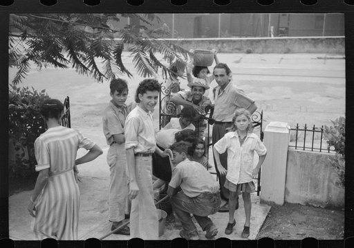 San Juan, Puerto Rico. People carrying water home because of the failure of the water system in San Juan for three days