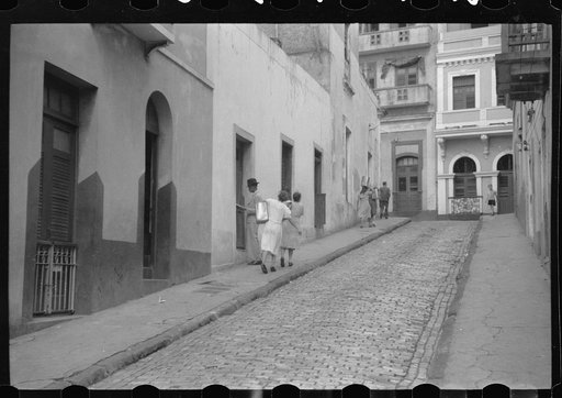 San Juan, Puerto Rico. People carrying water home because of the failure of the water system in San Juan for three days