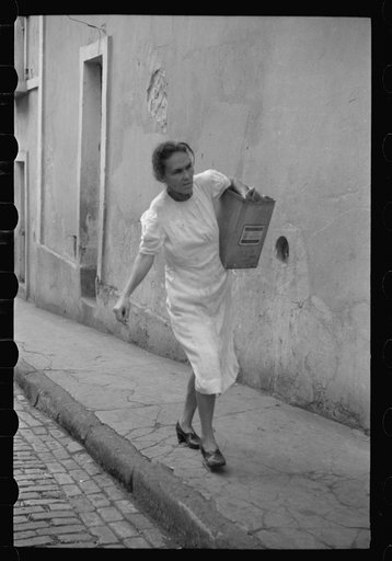San Juan, Puerto Rico. People carrying water home because of the failure of the water system in San Juan for three days