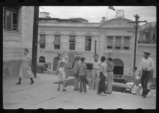 San Juan, Puerto Rico. People carrying water home because of the failure of the water system in San Juan for three days